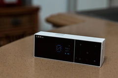 Lifa Air LAM05 Air purifier controller lifestyle on table device on